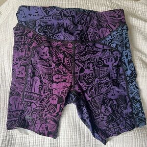 Janji 7” Groundwork Pace Purple Running Shorts.